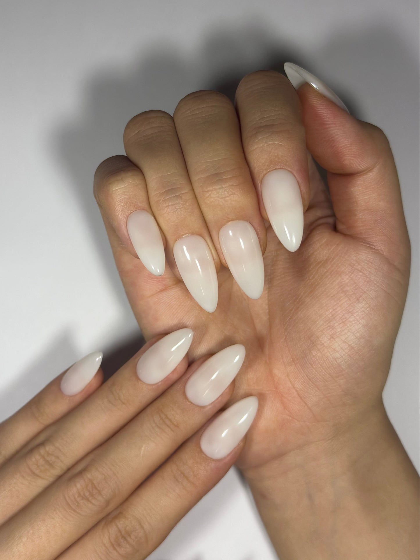 Glossy White Almond Press-on Nails, Salon-quality and Long-lasting | Secure The Nails