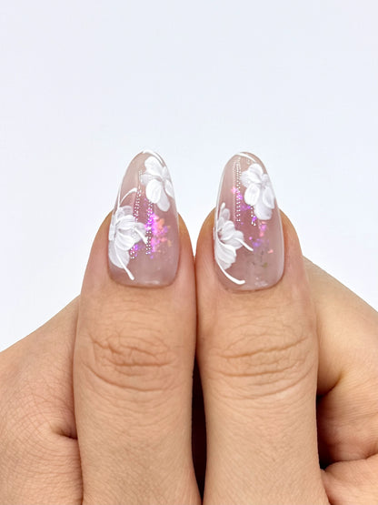 Soft Mauve Nude Almond Oval Press-On Nails with Handpainted White Flower and Pink Iridescent Shimmer