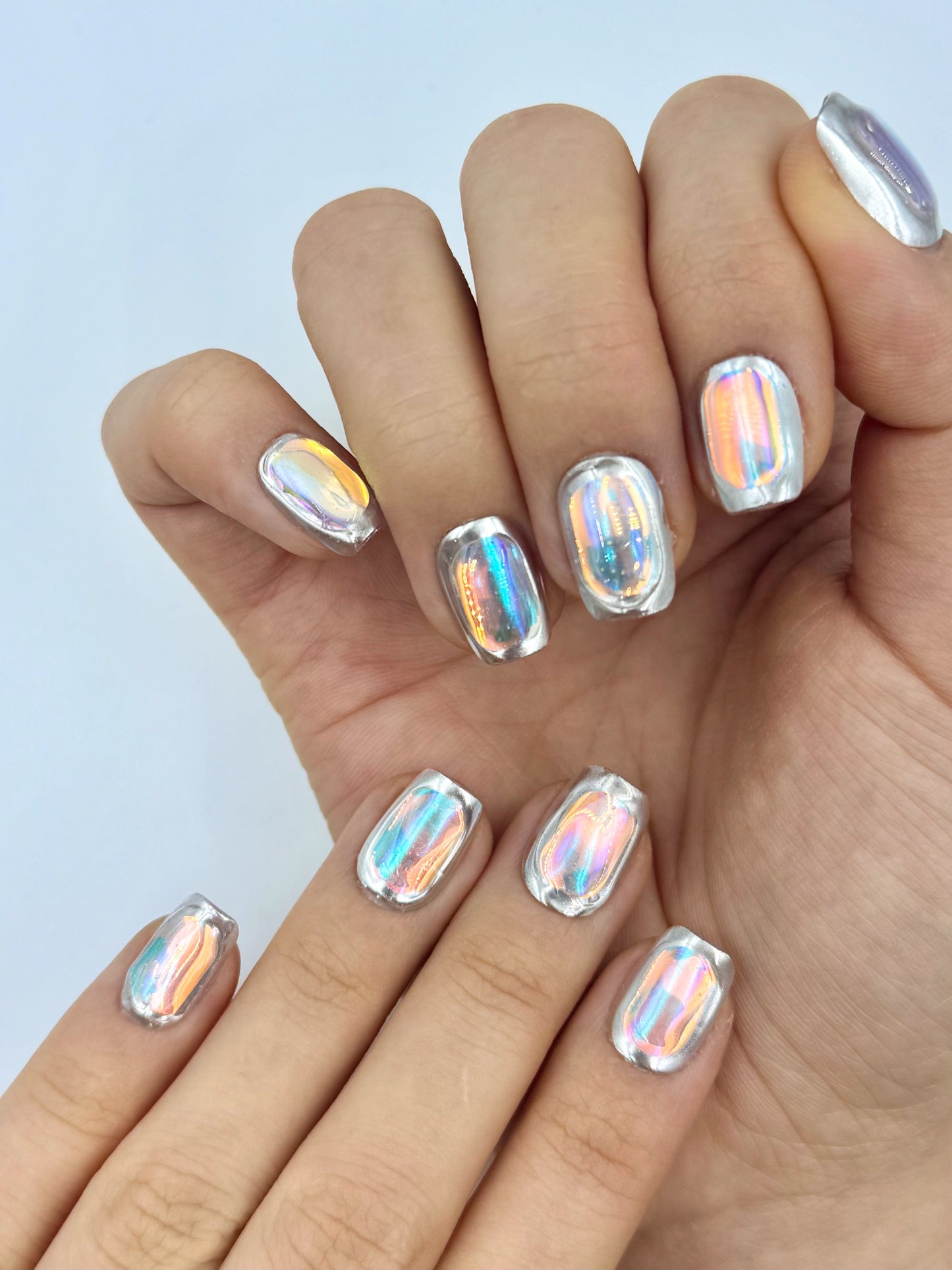 Futuristic Mirror Glass Reflective Holographic Foil Color-Shifting Silver Chrome Short Square Reusable Press-On Nails, 2026 Viral Nail Art Design | Secure The Nails