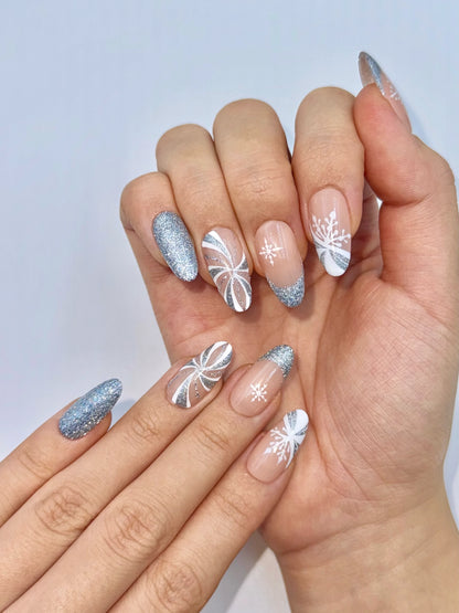 Christmas Holiday Reflective Sparkly Icy Blue Snowflake Candy Cane Almond Press-On Nails, Flash Glitter Gel, Unique Cute Winter Nail Art Design | Secure The Nails