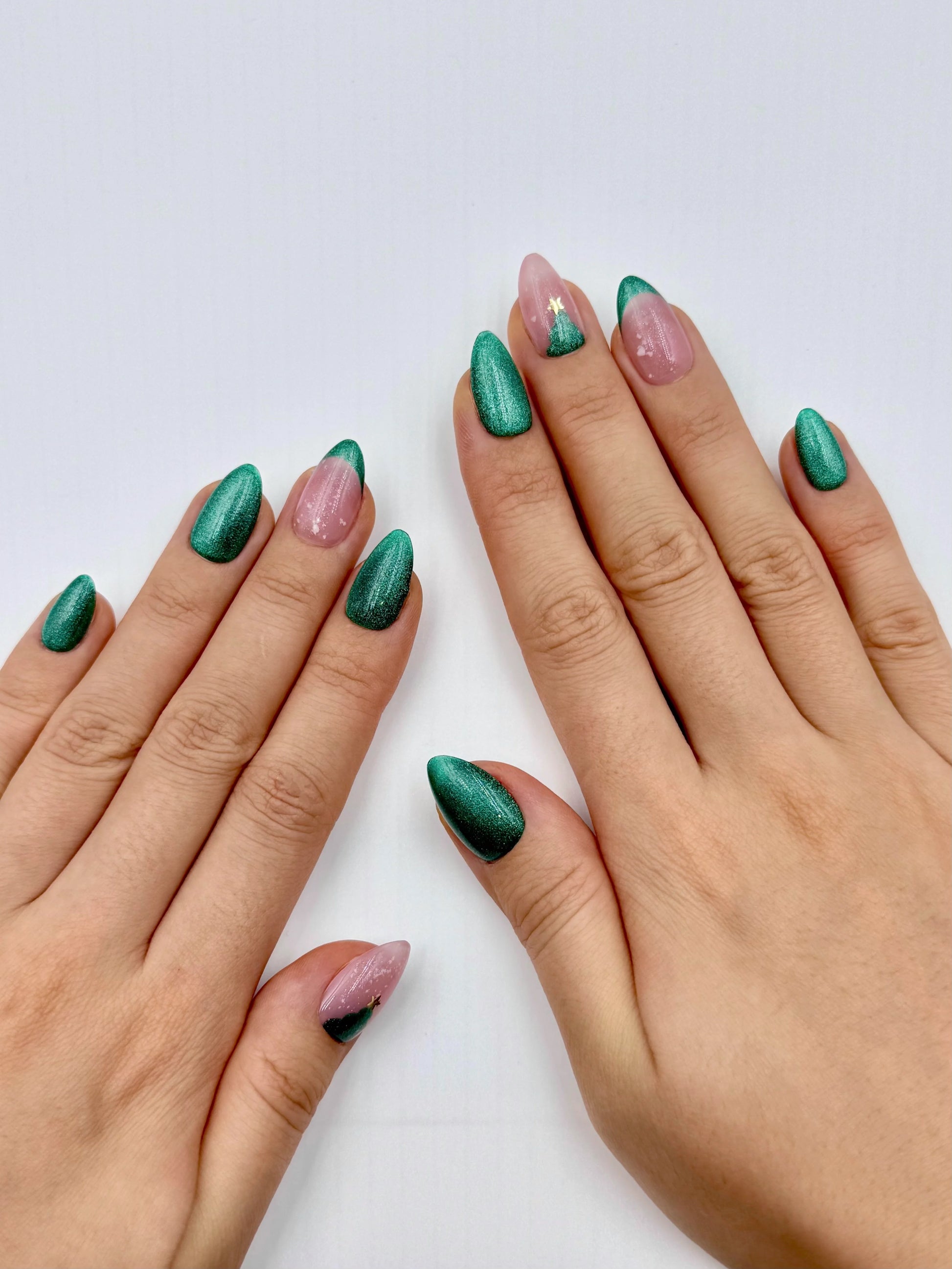 Festive Emerald Green Cat-Eye Christmas Holiday Almond Nude French Tip Reusable Press-On Nails with Tree Falling Snow Design| Classy Elegant Winter Nail Art | Secure The Nails