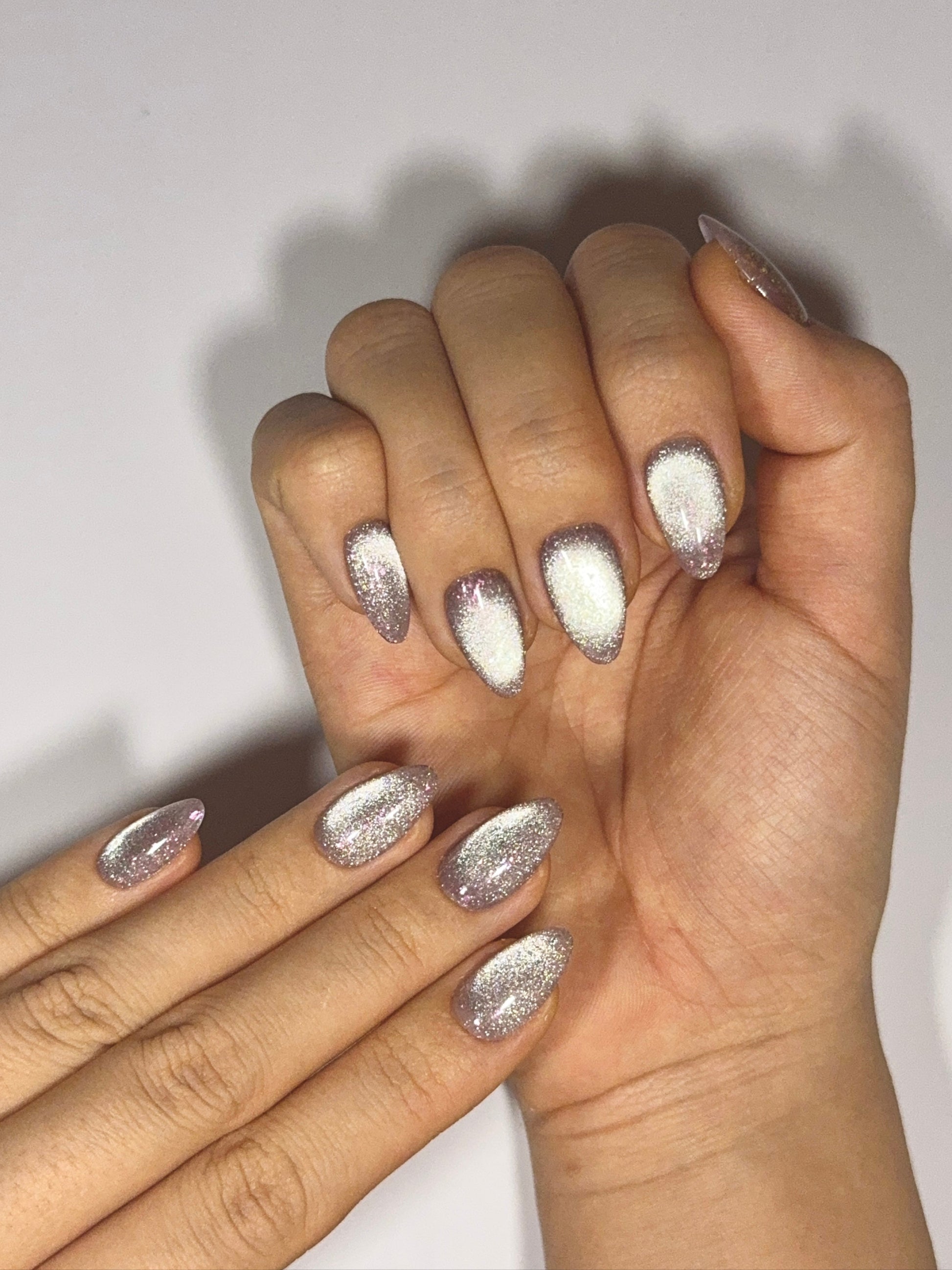 Unique Silver Cat-Eye Handmade Press-On Nails in Short Almond with large Pink glitter sparkles for Winter Holiday | Secure The Nails