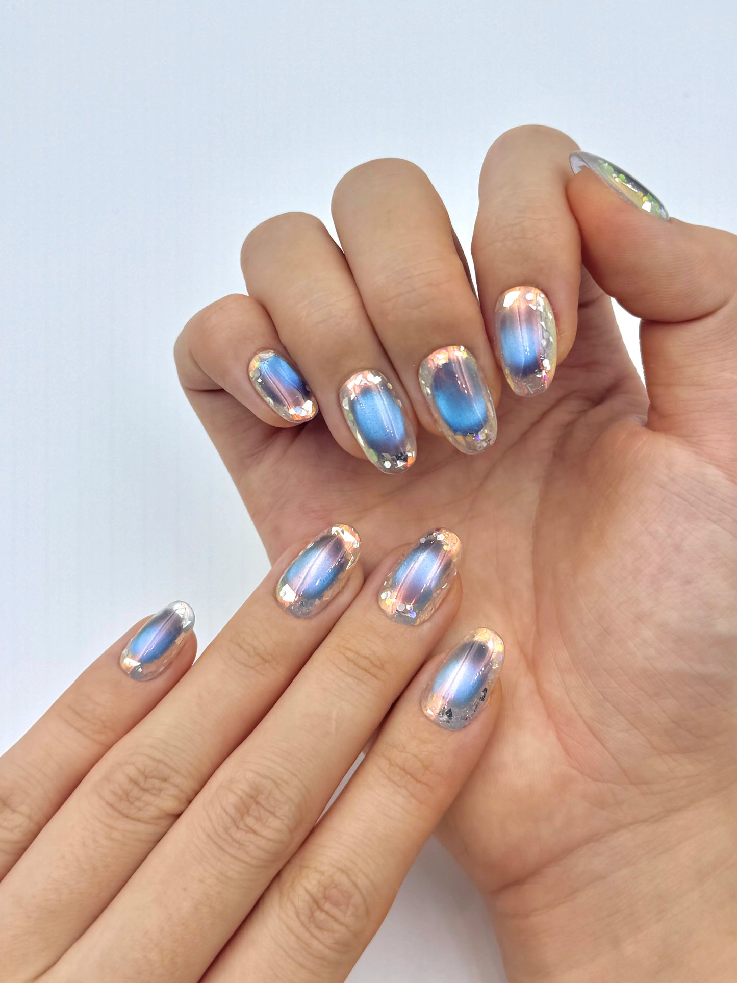 Iridescent Holographic Nail Foil Designs Glowy Blue Cat-Eye Press-On Nails, Glass Effect Ultra-Reflective Reusable Nails | Secure The Nails