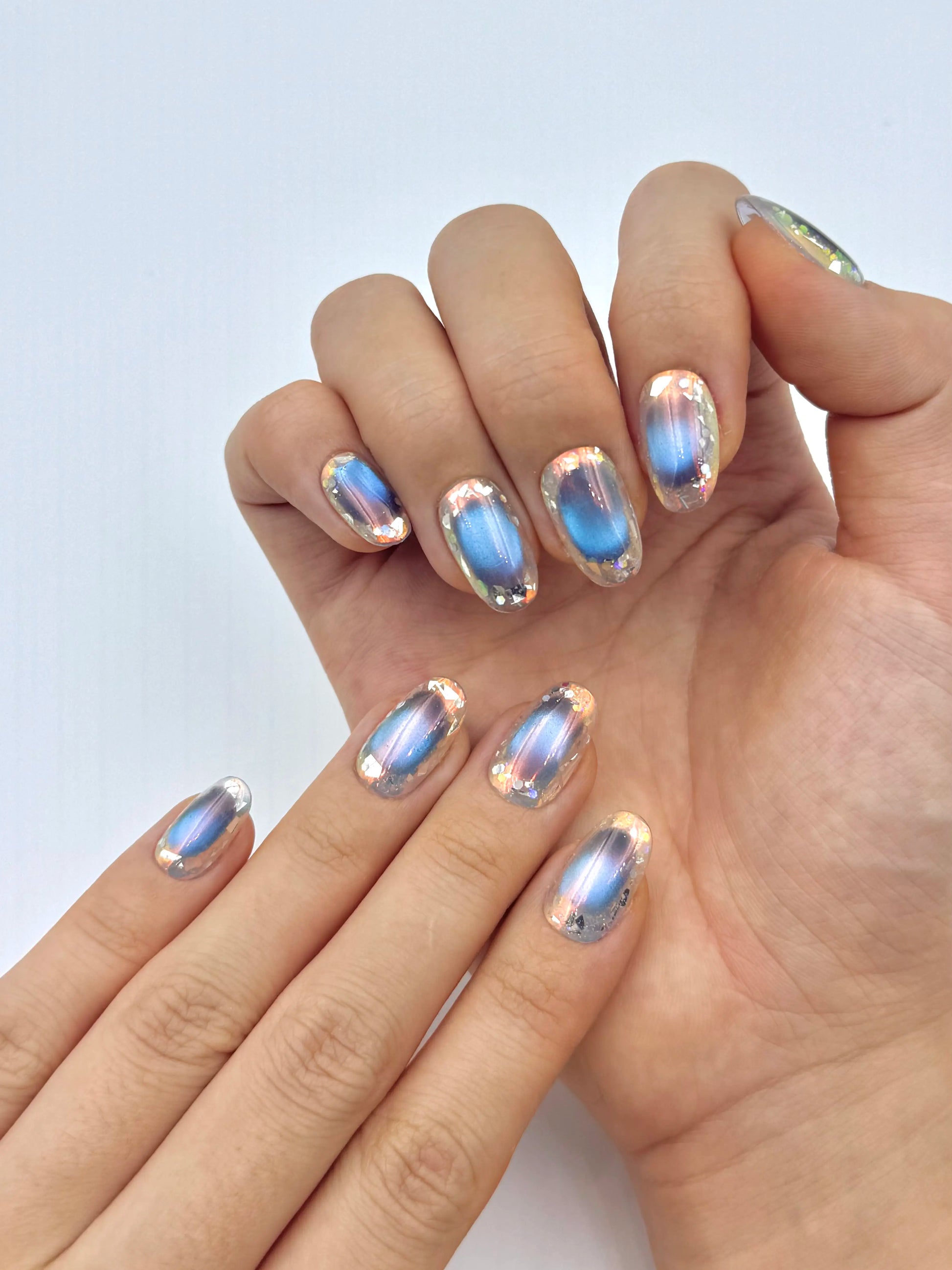 Iridescent Holographic Nail Foil Designs Glowy Blue Cat-Eye Press-On Nails, Glass Effect Ultra-Reflective Reusable Nails | Secure The Nails