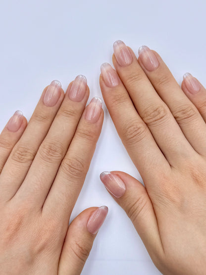 Glowy Peach Nude Cat-Eye Oval Press-On Nails with Smile Line Golden French Tip and Silver Glitter