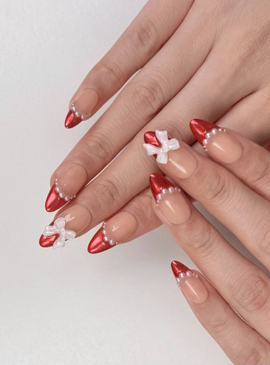 Cute Elegant Christmas Holiday Red Chrome French Tip Press-On Nails with Pearls and Bow Ribbon Winter Nail Art | Secure The Nails