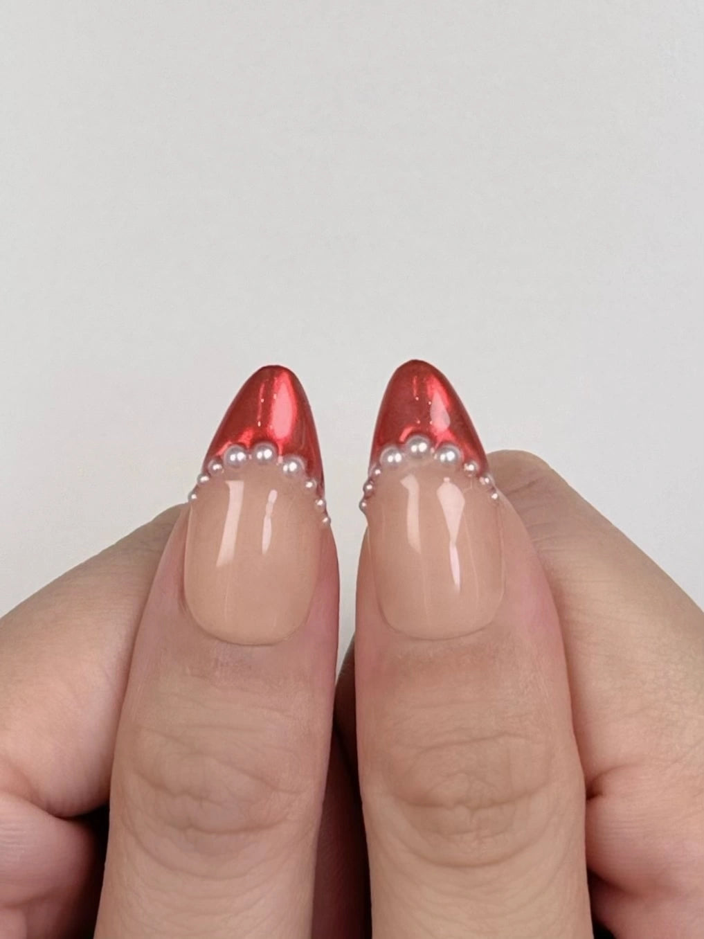 Cute Girly Christmas Holiday Red Chrome Almond French Tip Press-On Nails with Pearls and Bow Ribbon, Unique Elegant Winter Nail Art | Secure The Nails