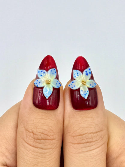 Dark Red Cat-Eye Almond Press-Ons with 3D Gel Blue Tropical Flower