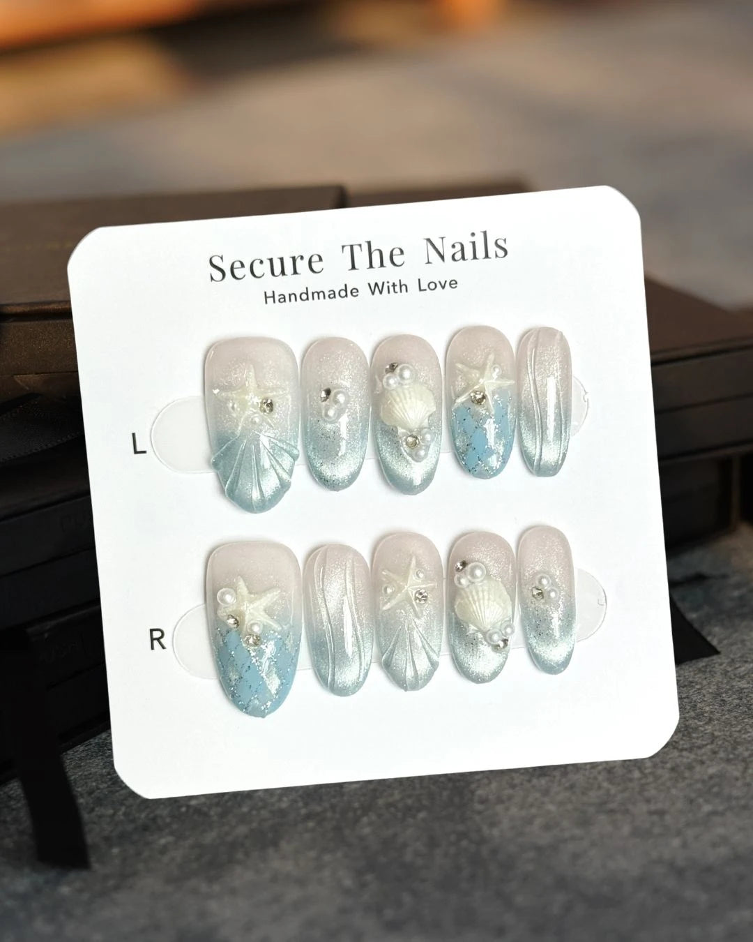 Handmade Glowy Silver Blue Cat-Eye 3D Tropical Almond Oval Press-On Nails with Starfish and Pearl, Long-Lasting Reusable Press-Ons | Secure The Nails