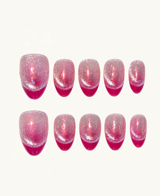 Fuchsia Aura press-on nails on a clean background