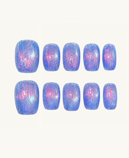 Nebula Dream press-on nails on a clean background