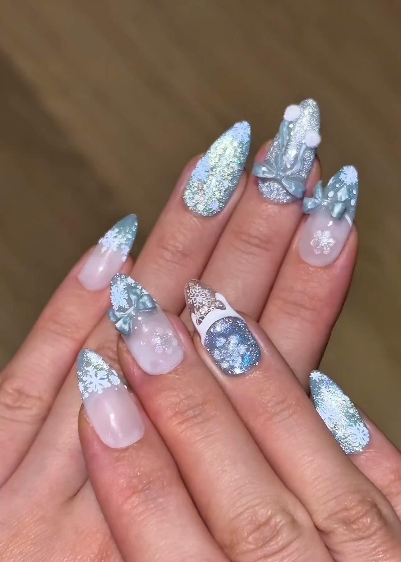 Christmas Holiday Snowflake Bow Ribbon Almond French Tip Press-On Nails with Fluffy Pom-Poms, Cute Unique Glittery Winter Nail Art | Secure The Nails