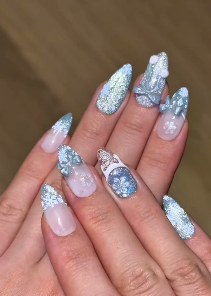 Christmas Holiday Snowflake Bow Ribbon Almond French Tip Press-On Nails with Fluffy Pom-Poms, Cute Unique Glittery Winter Nail Art | Secure The Nails