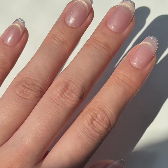 Glowy Soft Peach Blush Nude Cat-Eye Oval Round Press-On Nails with Golden Smile Line and Silver Glitter Micro French Tip