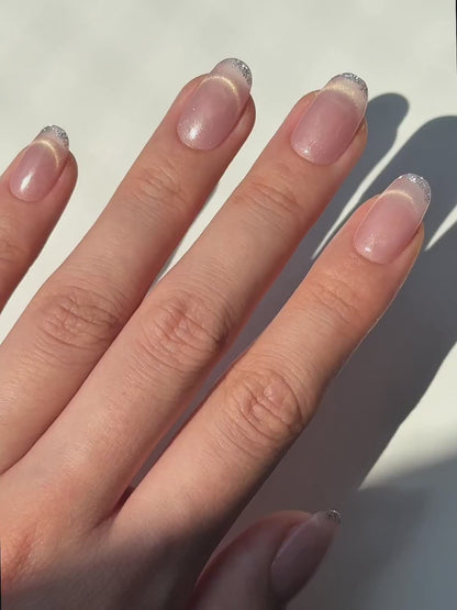 Glowy Soft Peach Blush Nude Cat-Eye Oval Round Press-On Nails with Golden Smile Line and Silver Glitter Micro French Tip