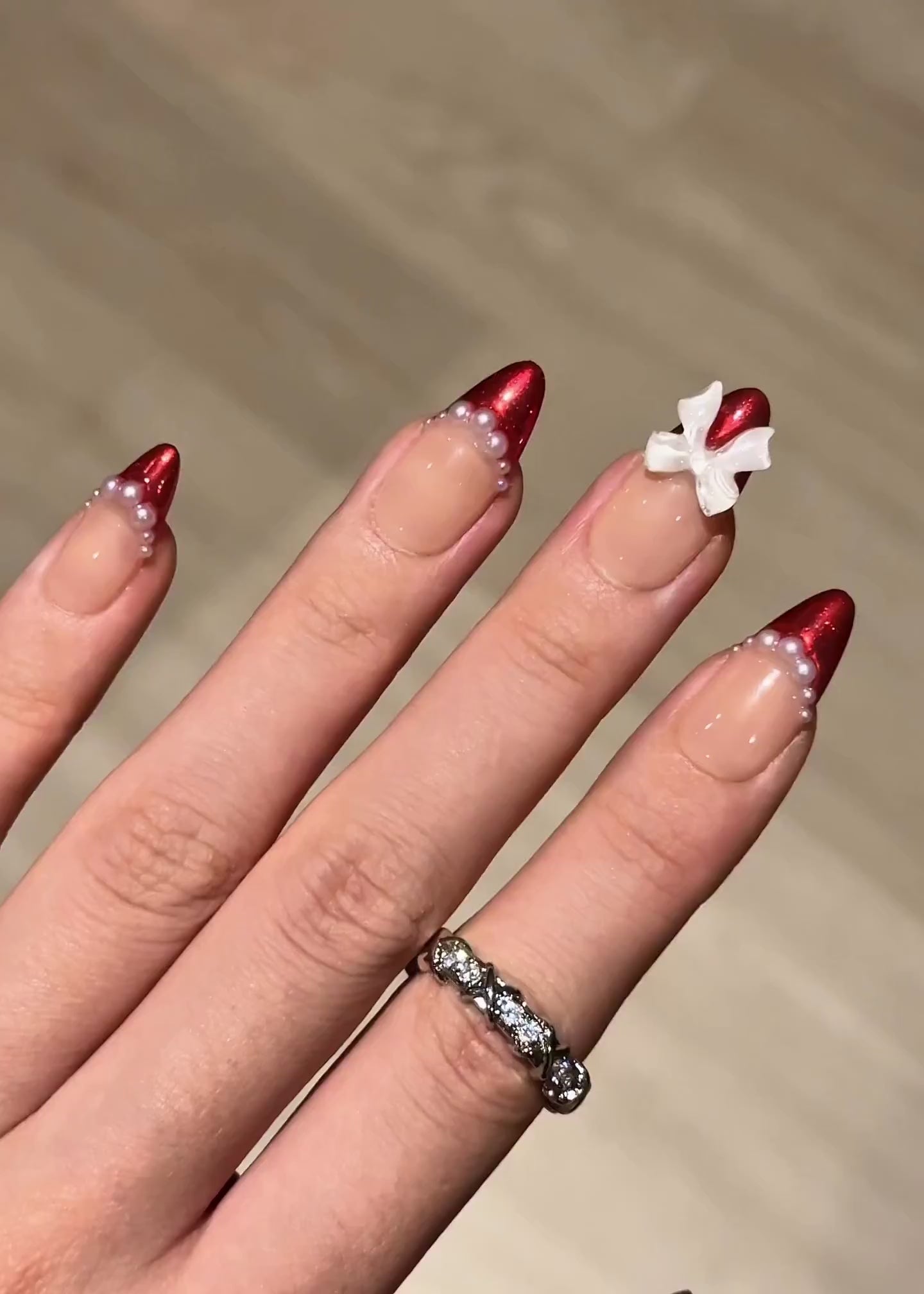 Cute Girly Christmas Holiday Red Chrome Almond French Tip Reusable Press-On Nails with Pearls, Bow Ribbon, Unique Elegant Winter Nail Art | Secure The Nails